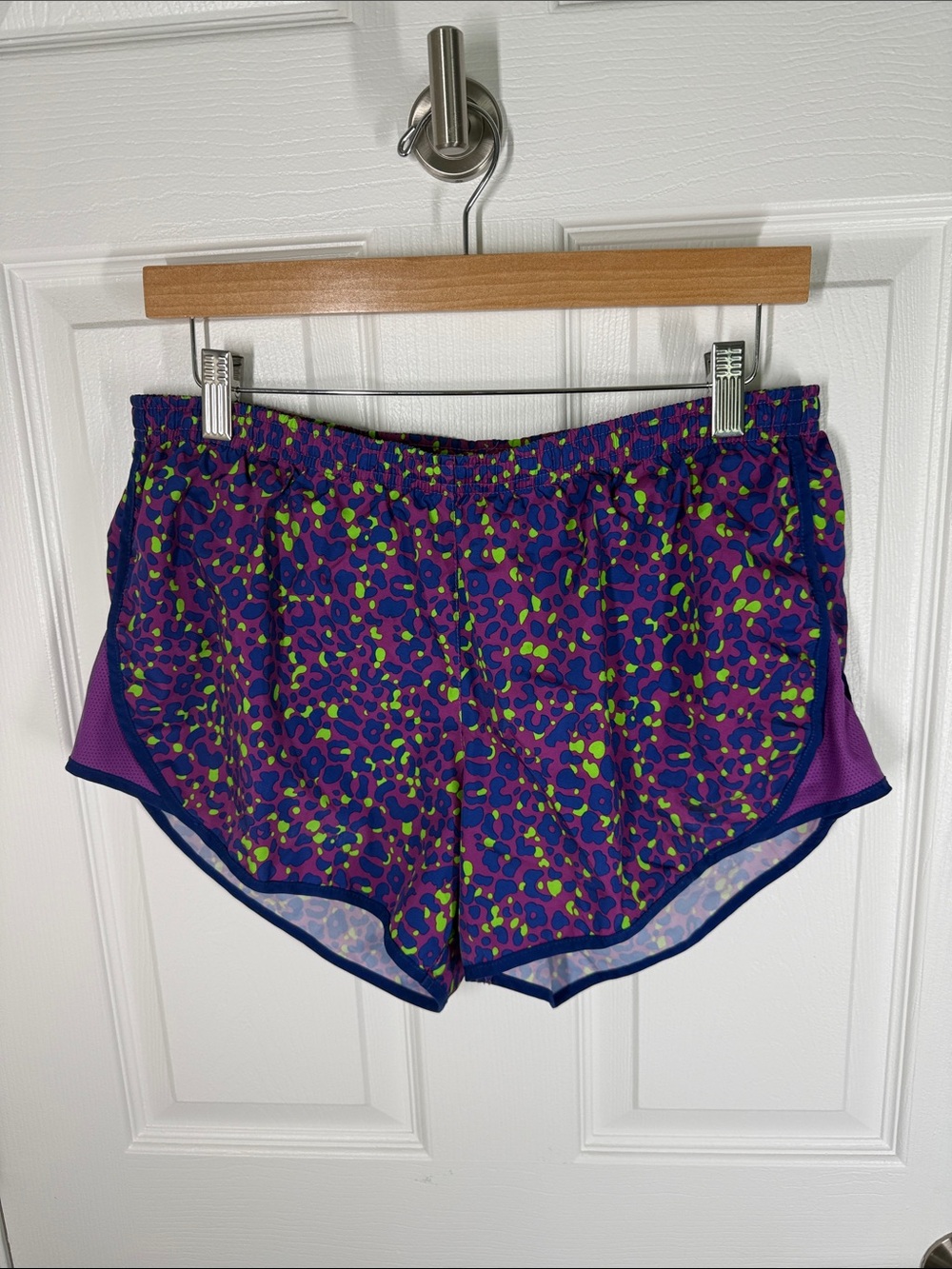 Nike dri-fit running shorts magenta, blue, and like green size medium
